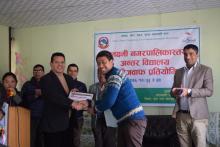 Mahalaxmi Municipality Inter School Quiz Competition Event Co-ordination team receiving token of love